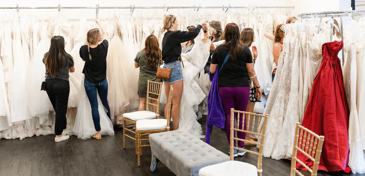 Bridal buyer sourcing dresses at National Bridal Market Chicago