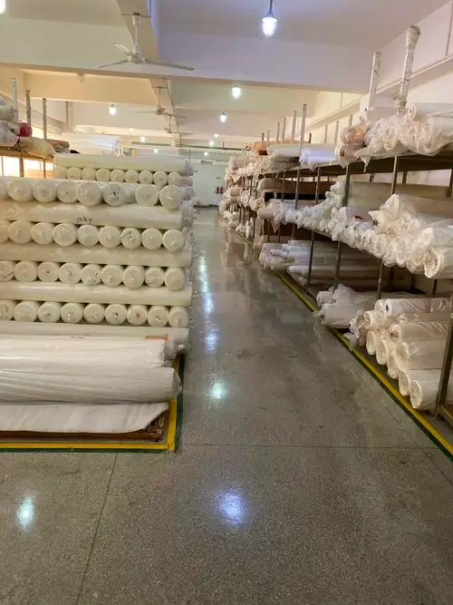 bridal fabric warehouse with lace, satin, and tulle inventory